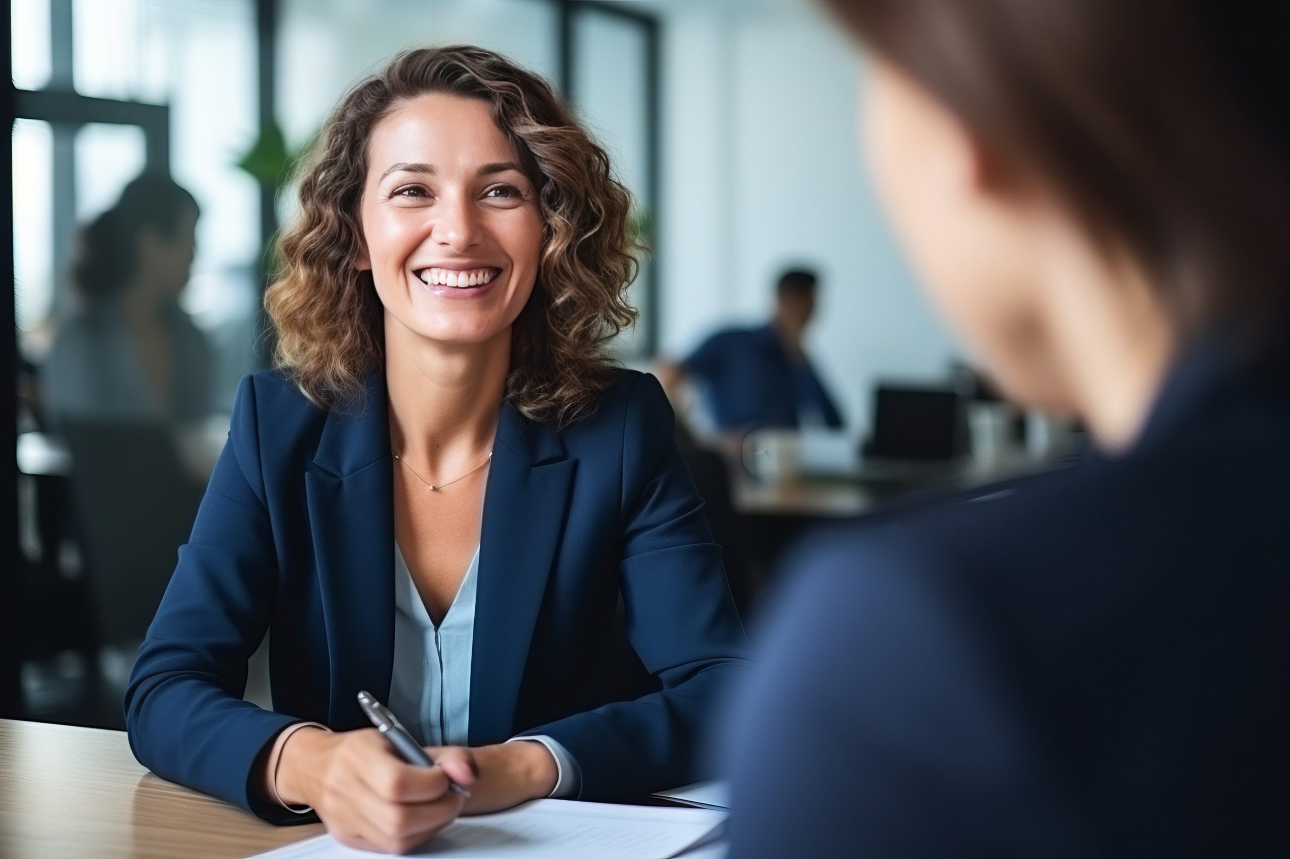 Happy mid aged business woman manager at the meeting